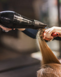 Peinado de novia a domicilio para el día de la boda
